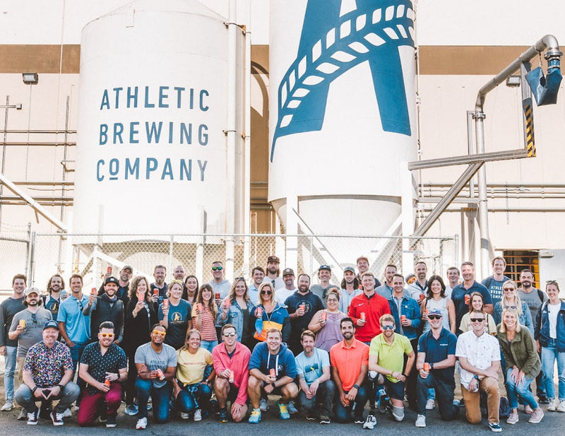 Athletic Team in front of brewery